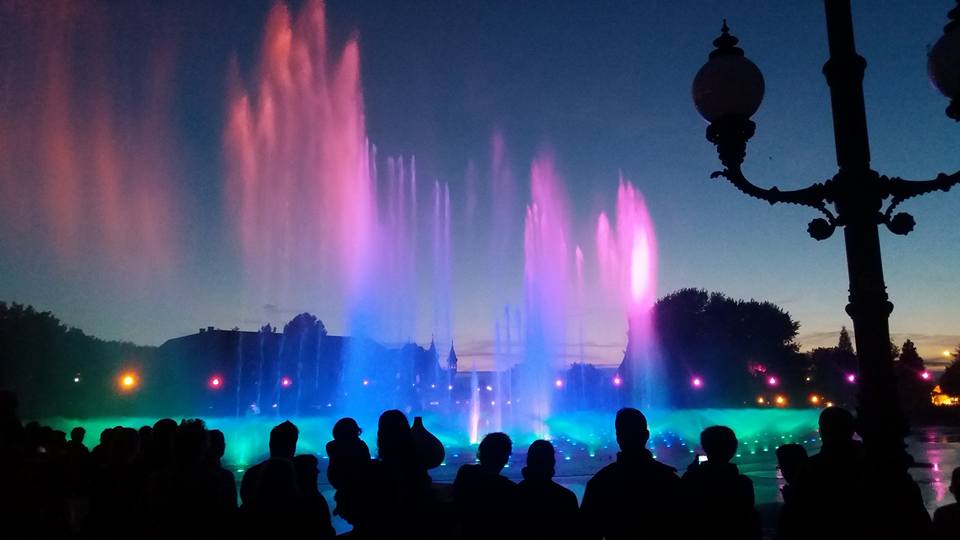 Image may contain: people standing, night, sky and outdoor